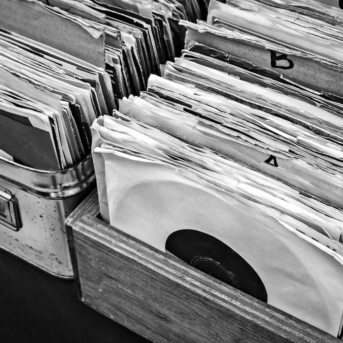 Retro styled image of lp records on a flee market